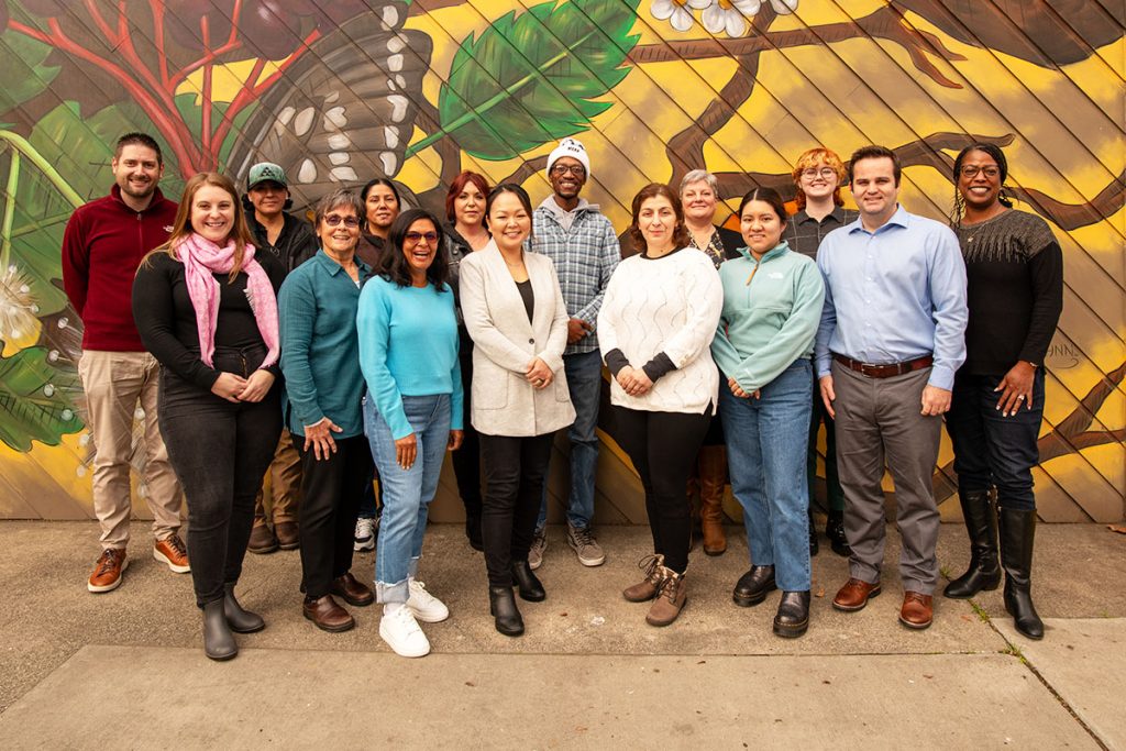 A group photo of men and women