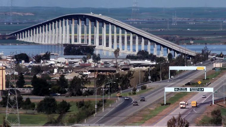 A tall bridge over a wide river