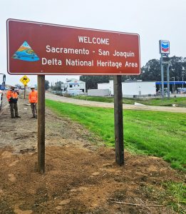 A road sign welcoming motorists to the Sacramento-San Joaquin Delta National Heritage Area