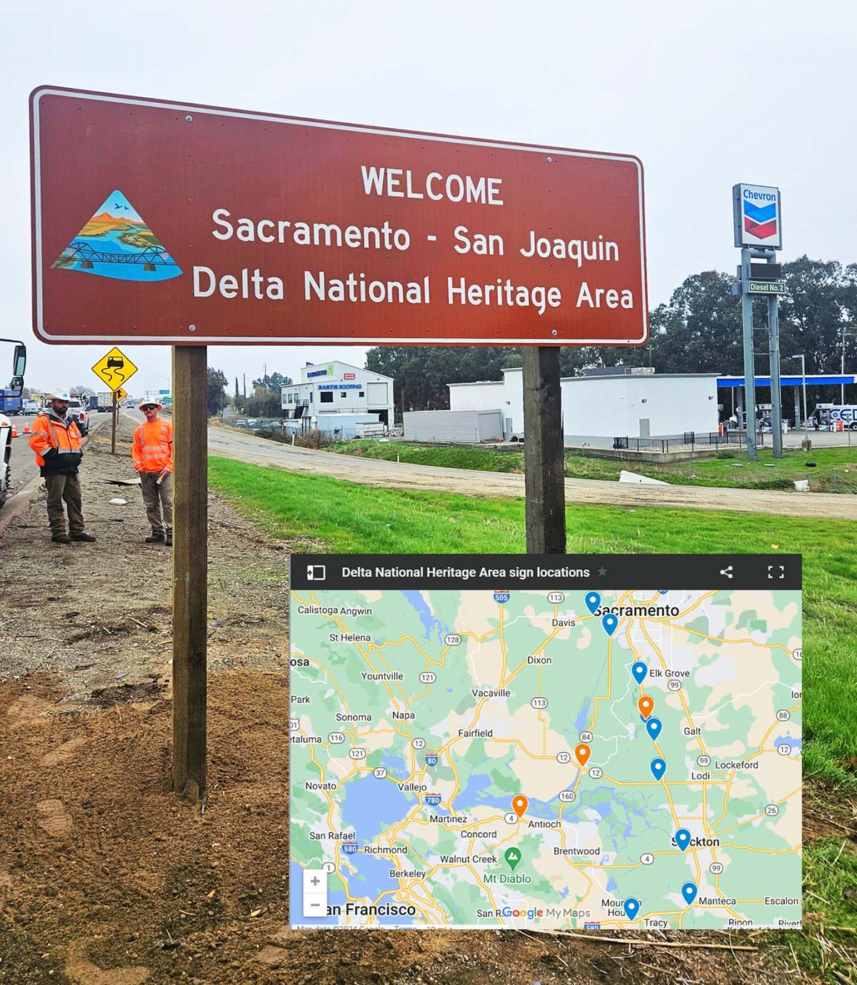 A road sign with a locator map superimposed over it