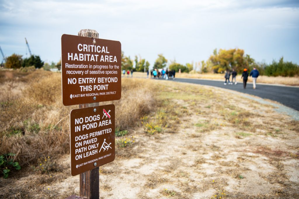 A sign advising pedestrians they are entering critical habitat