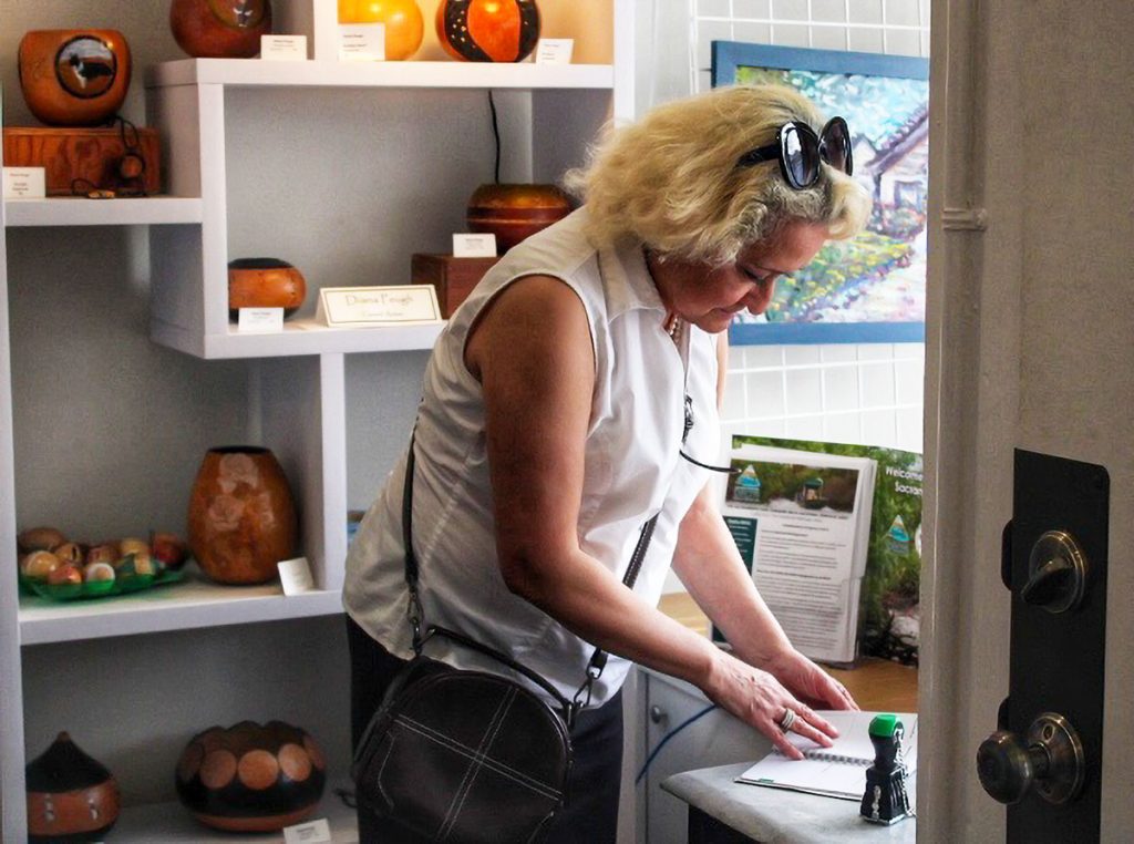 A woman stamps a passport
